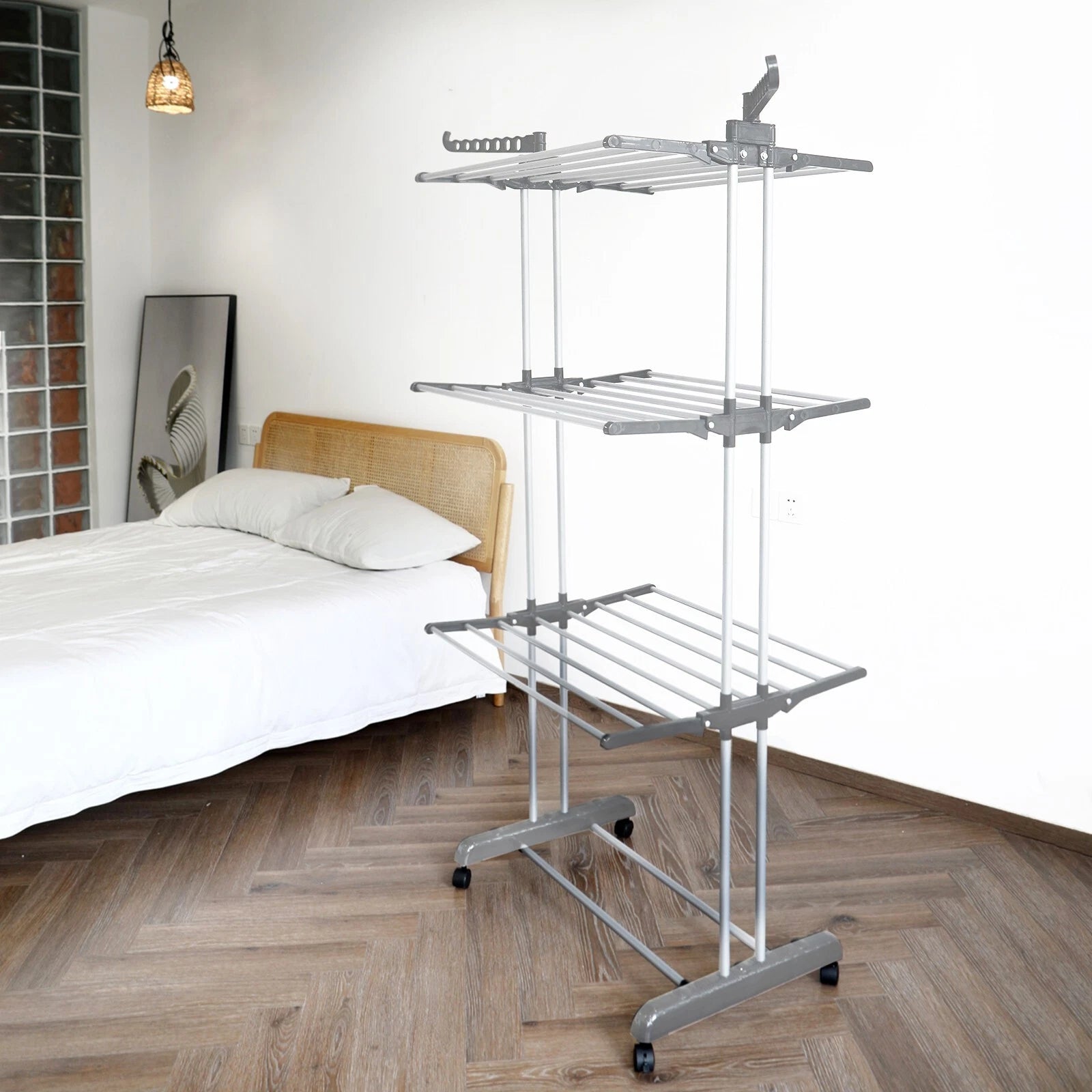 Folding 3 Layer Cloth Drying Rack Stand is Kept in a Bedroom Setup.