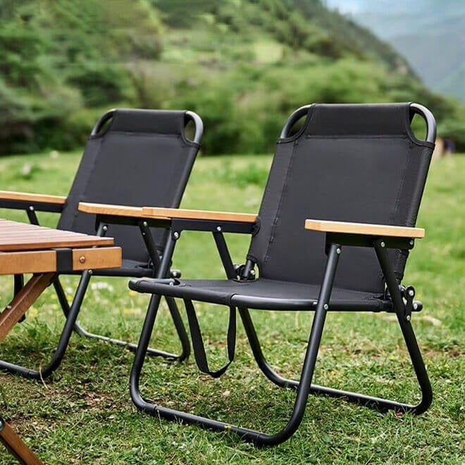 Folding Camping Chairs are Arranged in a Camping Area.