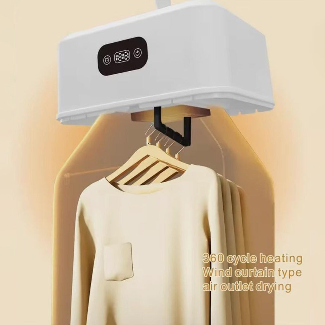 A Folding Electric Cloth Drying Heater With Cloth Hanged On it.