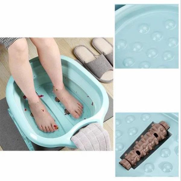 A Women is Washing Her Feet Using Folding Foot Tub Portable Foot Wash Tub Massage Bucket. 