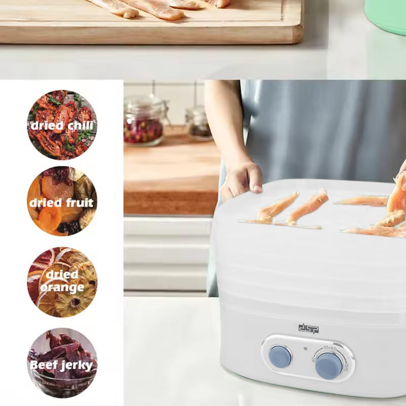 A Woman is Keeping Foods in to Food Dehydrator.