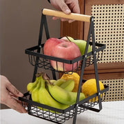 A Person is Holding Fruit Display Stand.
