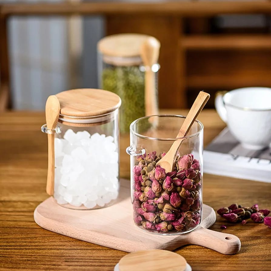 Glass Food Storage Jars are Filled with Dry Fruits.