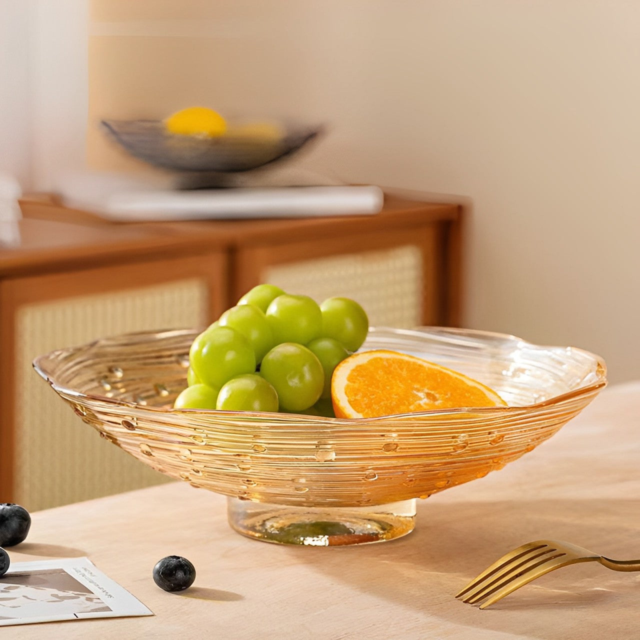 Fruits Are Served In a Glass Fruit Bowl.