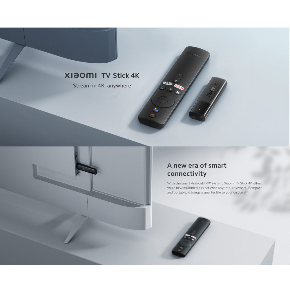 Xiaomi TV Stick 4K placed on the table next to a TV