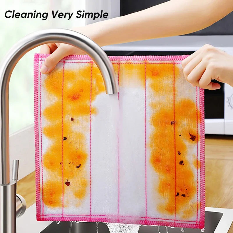 Someone is cleaning a Kitchen Dishwashing Cloth
