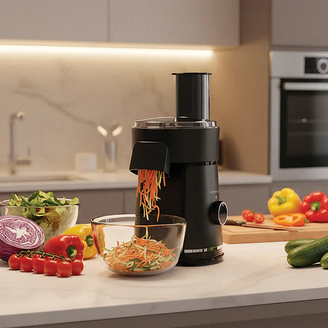 A Green Lion 6-in-1 Electric Salad Maker is Cutting Vegetables in a  Modern Kitchen.