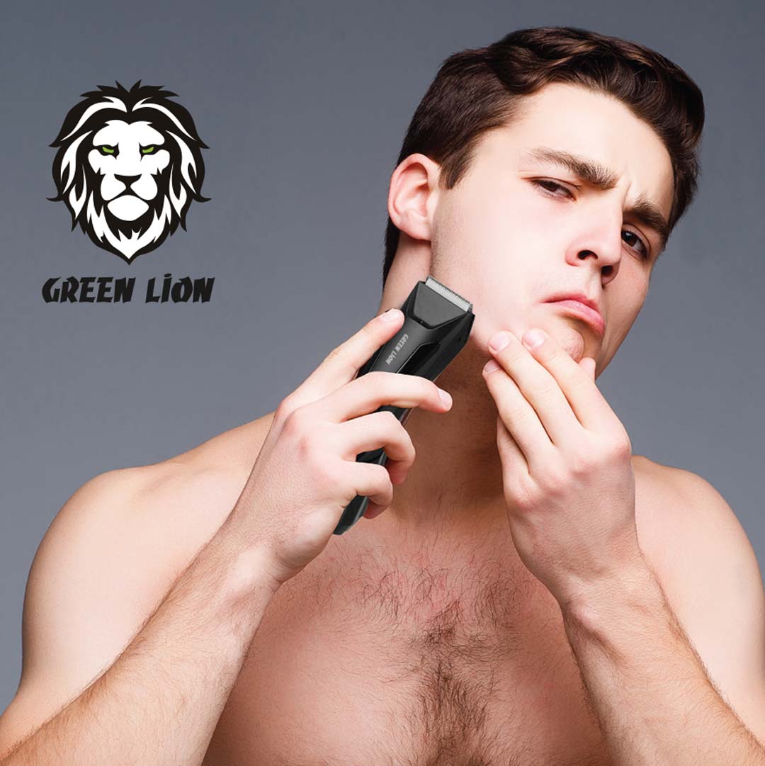 Man using a Green Lion Sensitive Pro Body Trimmer with 'Green Lion' logo in the corner