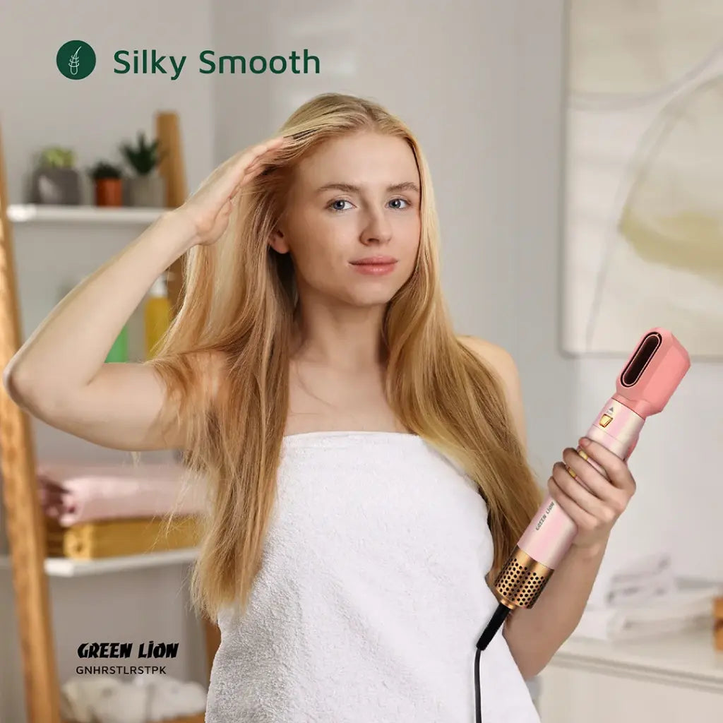 A Woman is Using Green Lion 5 - in -1 Professional Hair Styler for Styling Hair.