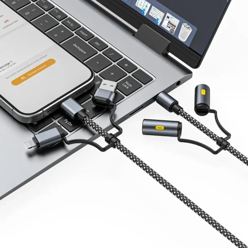 Green Lion Multi-Function 6-in-1 Cable is plugged into a laptop, charging a smartphone, with magnetic detachable tips for multiple device compatibility.