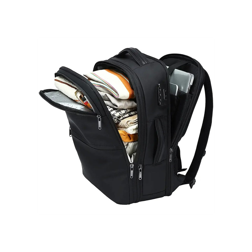 A Green Lion Chelsea Travel Backpack shown open on a plain white background, with folded clothing and a tablet visible inside the compartments.