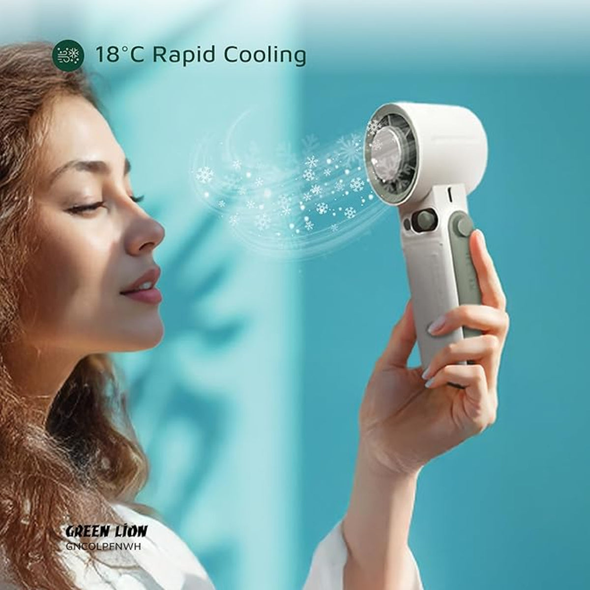 Woman holding a white Green Lion Coolio Portable Fan with '18°C Rapid Cooling' text, against a light blue background.