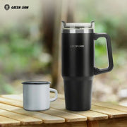 Green Lion Vacuum Travel Mug is Placed Along With a Cup.