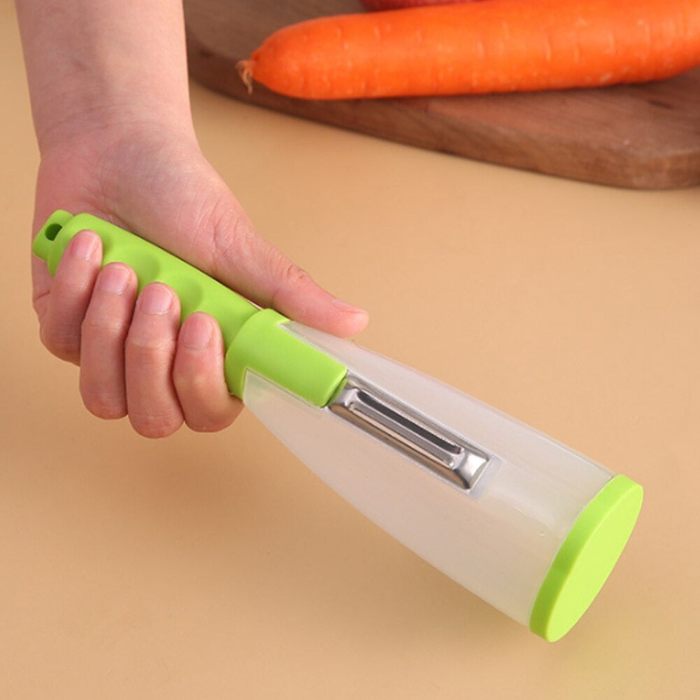 A Person Holds Multifunctional Stainless Steel Peeler With Container.