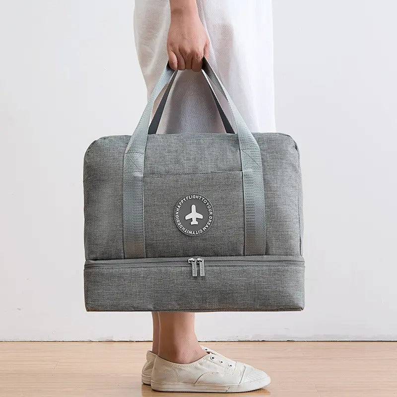 lady holding Gym Bag with Wet/Dry Separation