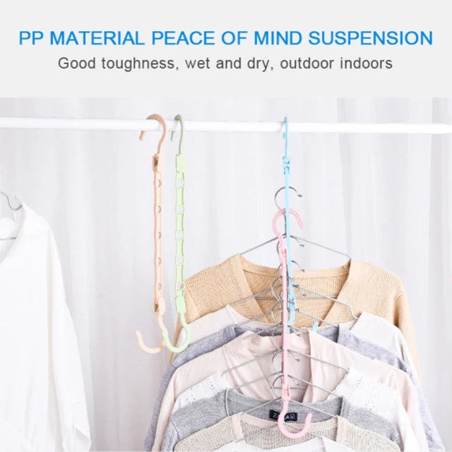 A collection of garments hanging on Multifunctional Adjustable Hook Cloth Hanger, organized on a rack
