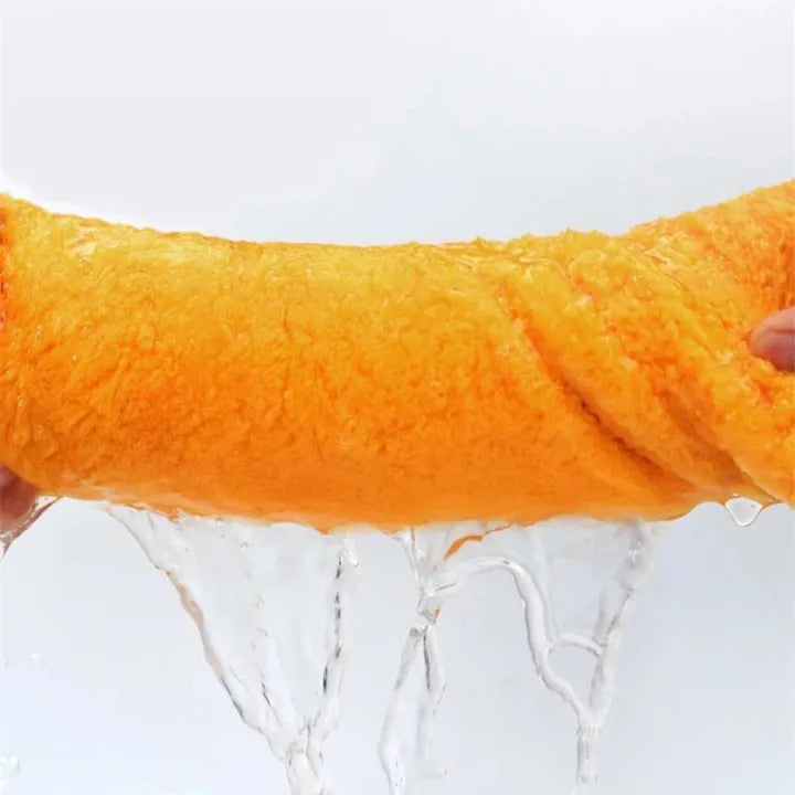A Person is Squeezing  Hair Drying Cap.