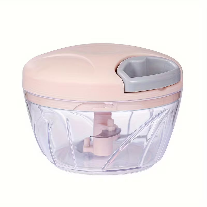 Handheld food chopper with a clear container and cream lid on a white background