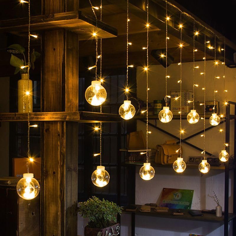 Hanging Ball String Lights are Hanged Inside House.