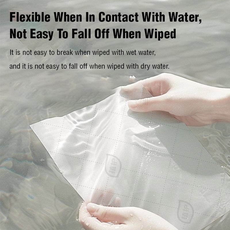 A Person is Dipping Hanging Tissue Paper in Water.