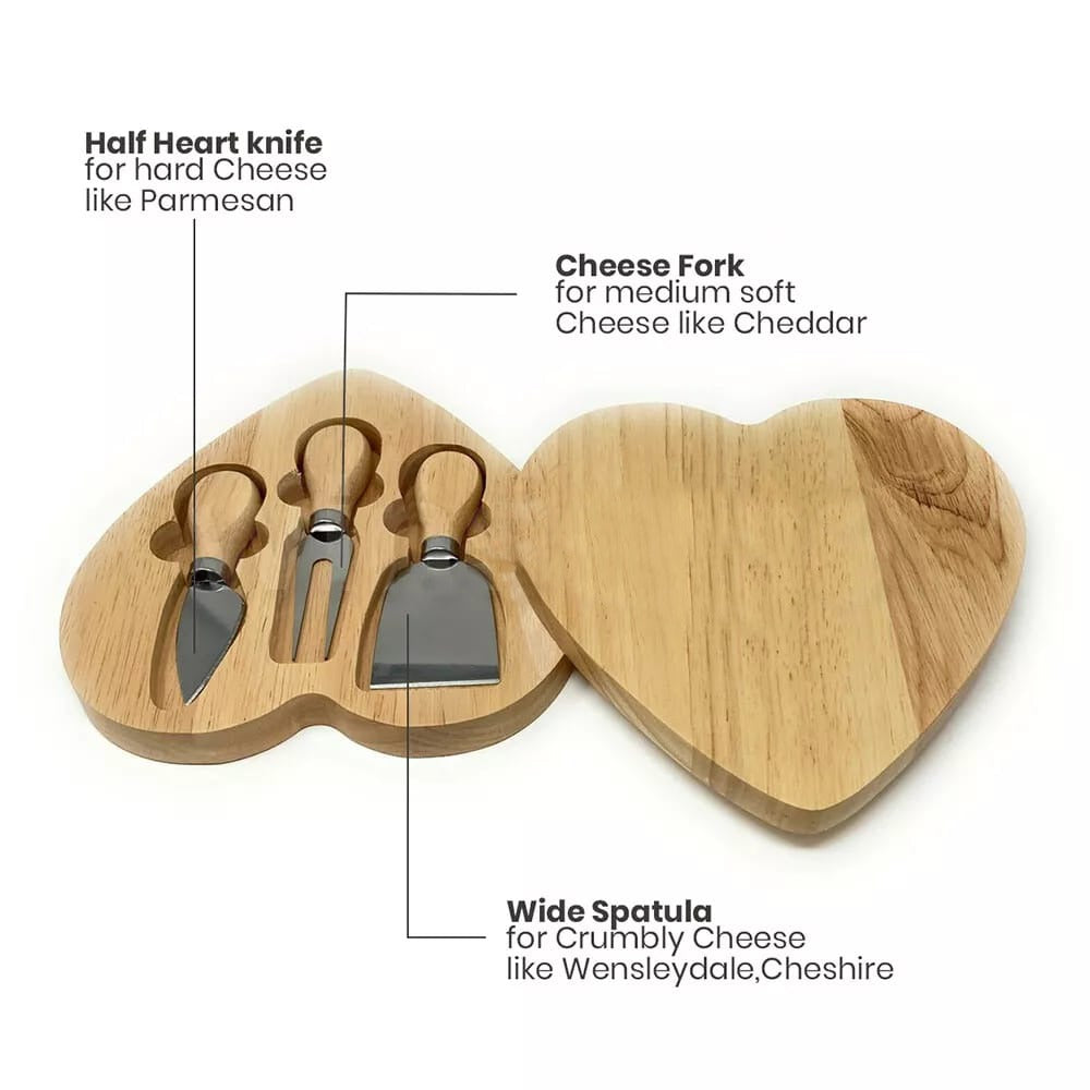 Heart-shaped wooden cheese board with built-in knife storage.