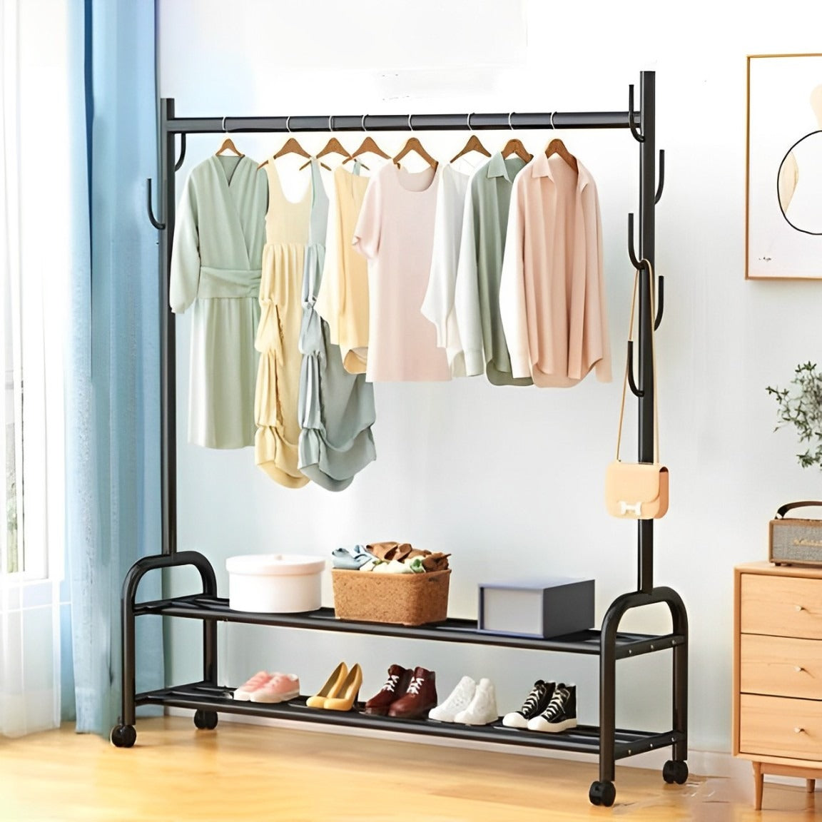 Heavy Duty Clothes Organizer Hanger Rack With Clothes and Shoes Are Arranged On it.