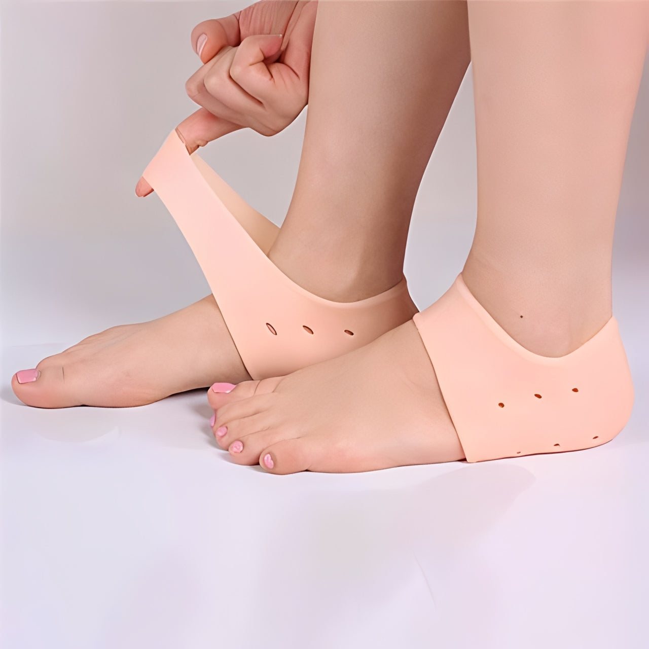 A Person is Wearing Heel Anti-Crack Set.