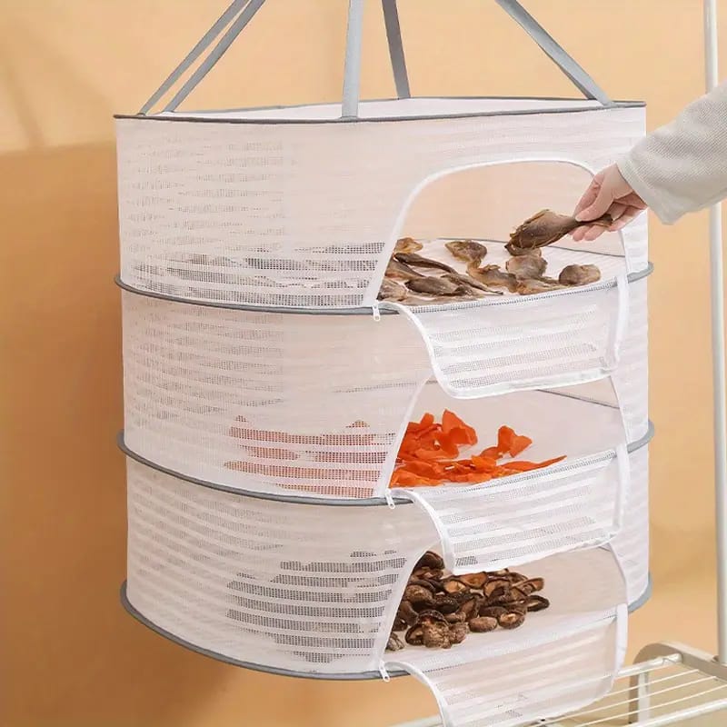 A Person is Arranging Food Items On Herb Drying Rack Net.