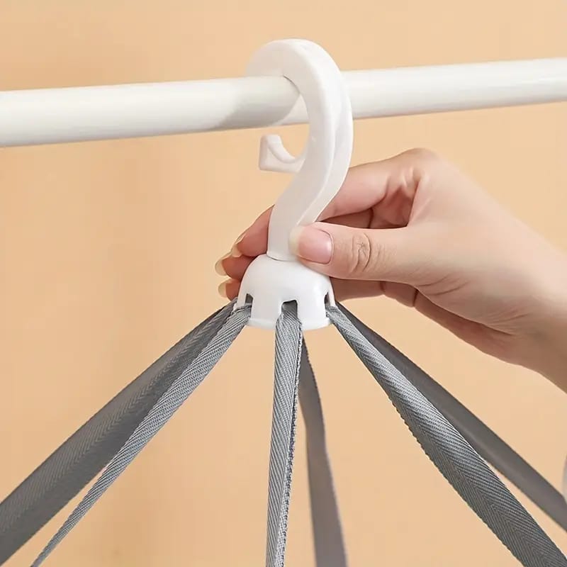 A Person is Hanging Herb Drying Rack Net.