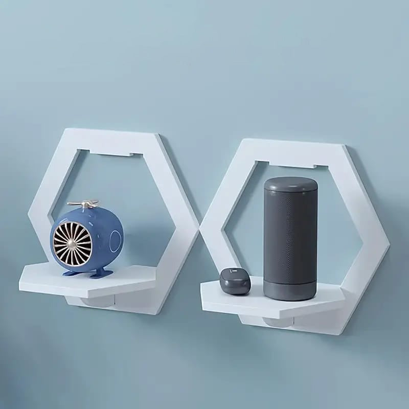 Hexagon Wall Organizer Shelf With Show Pieces On It.