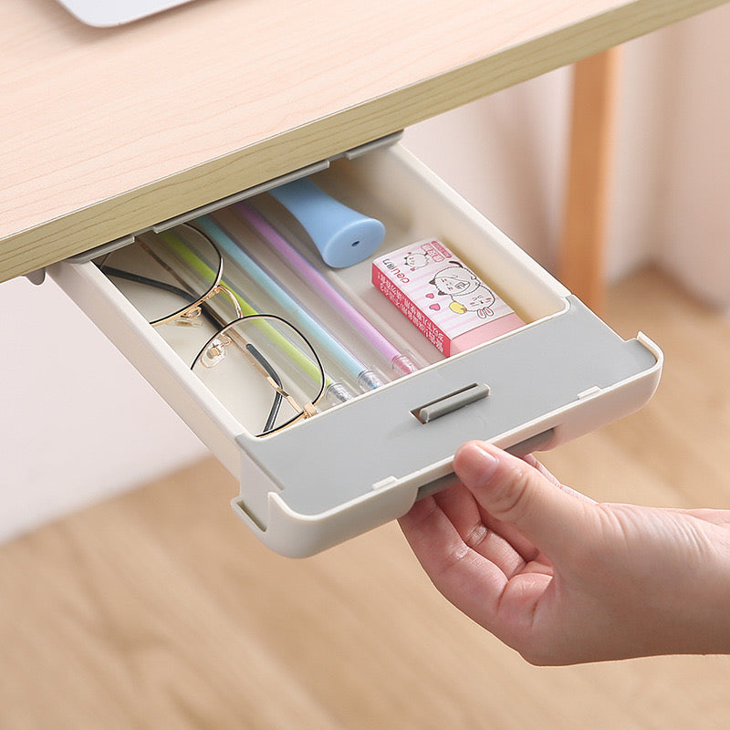Someone pulling Hidden Drawer Pencil Rack