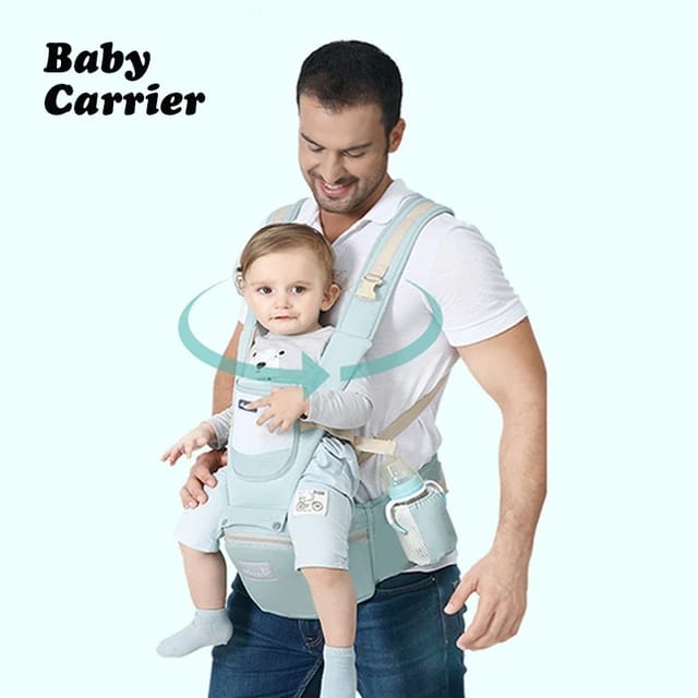 A man carrying with the help of an All-Position Baby Carrier