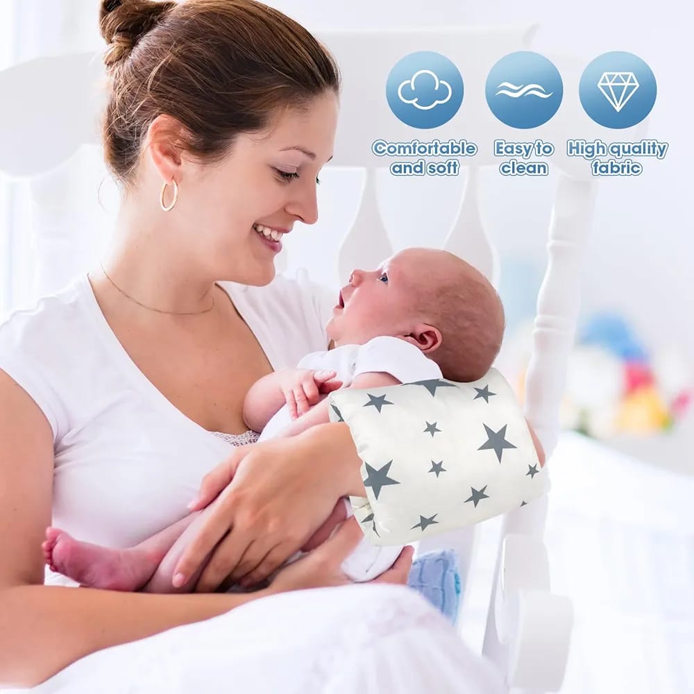 A Women is Holding Her Baby By Placing Nursing Arm Pillow On Her Hand.