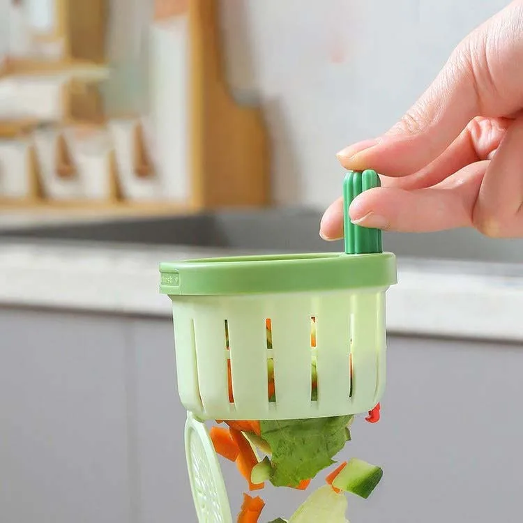 A Person is Holding Cute Kitchen Sink Drainer With Waste Particles.