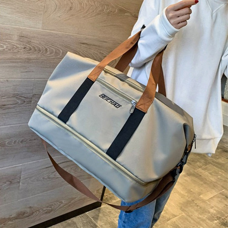A Girl is Holding Multi-functional Fashion Fitness Travel Duffle Bag.