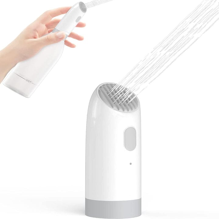 A Person is Holding Portable Electric Flushing Device.