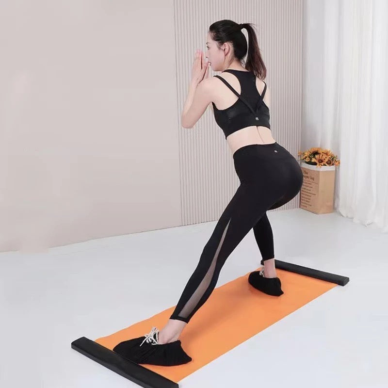 A lady is standing on the Unisex Exercise Sliding Mat