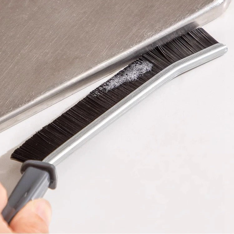 Someone cleaning tile gaps with Gap Cleaning Brush