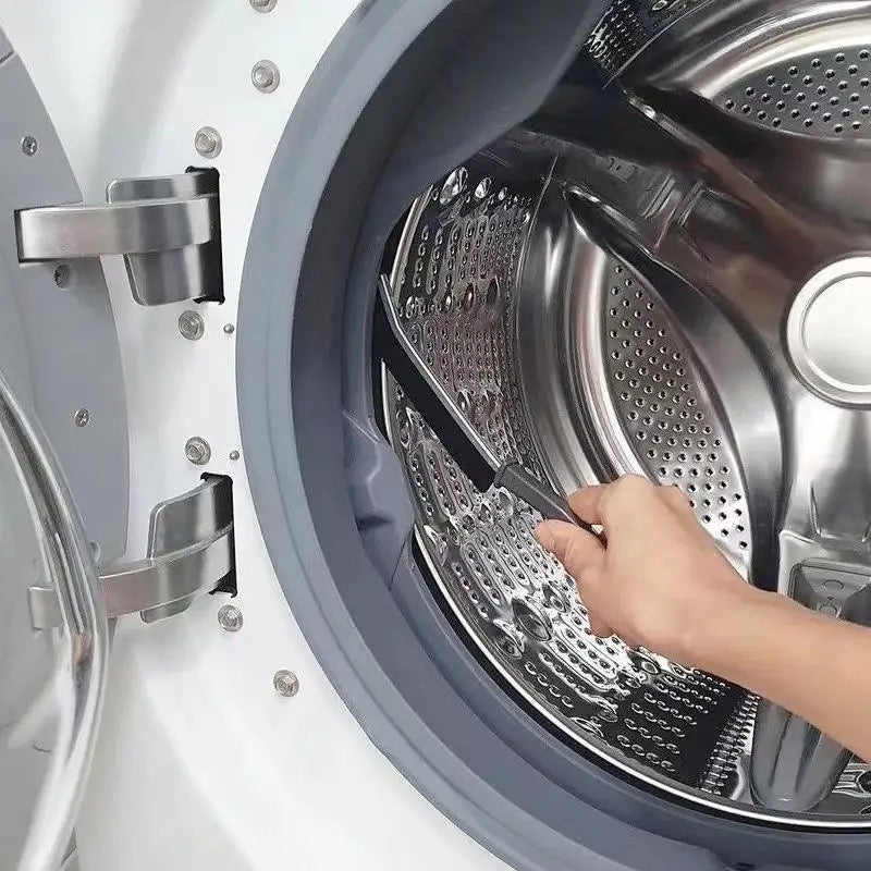 Someone is cleaning machines with the help of a Gap Cleaning Brush