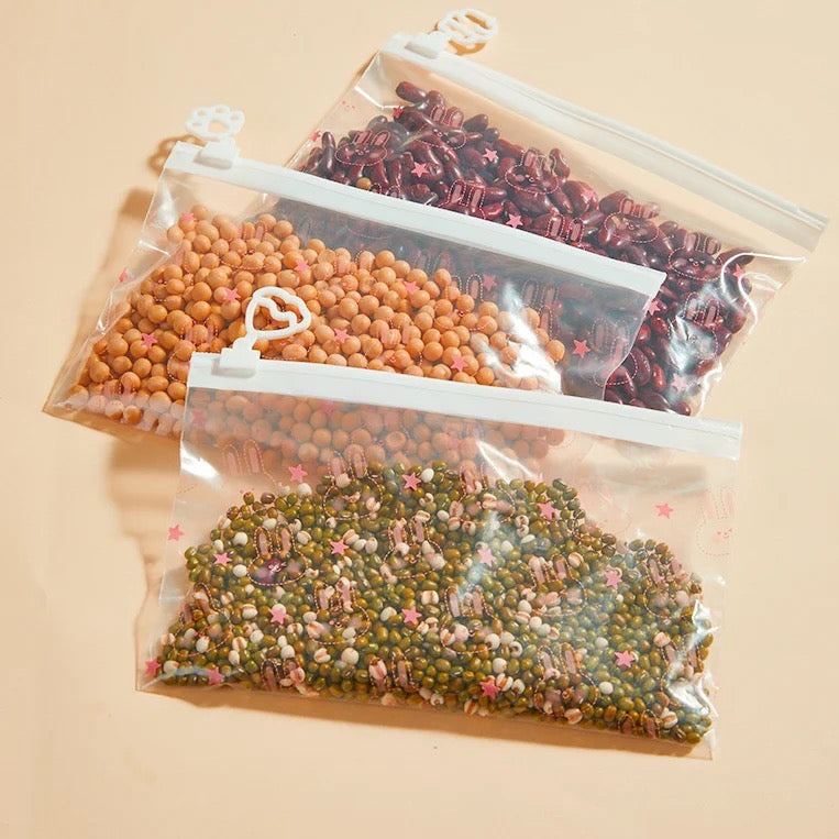 a group of Plastic Zip Bags With beans inside