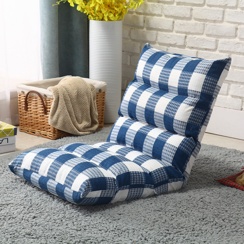 Blue+White color Lazy Lounge Sofa Bed placed near to a basket with cloths 