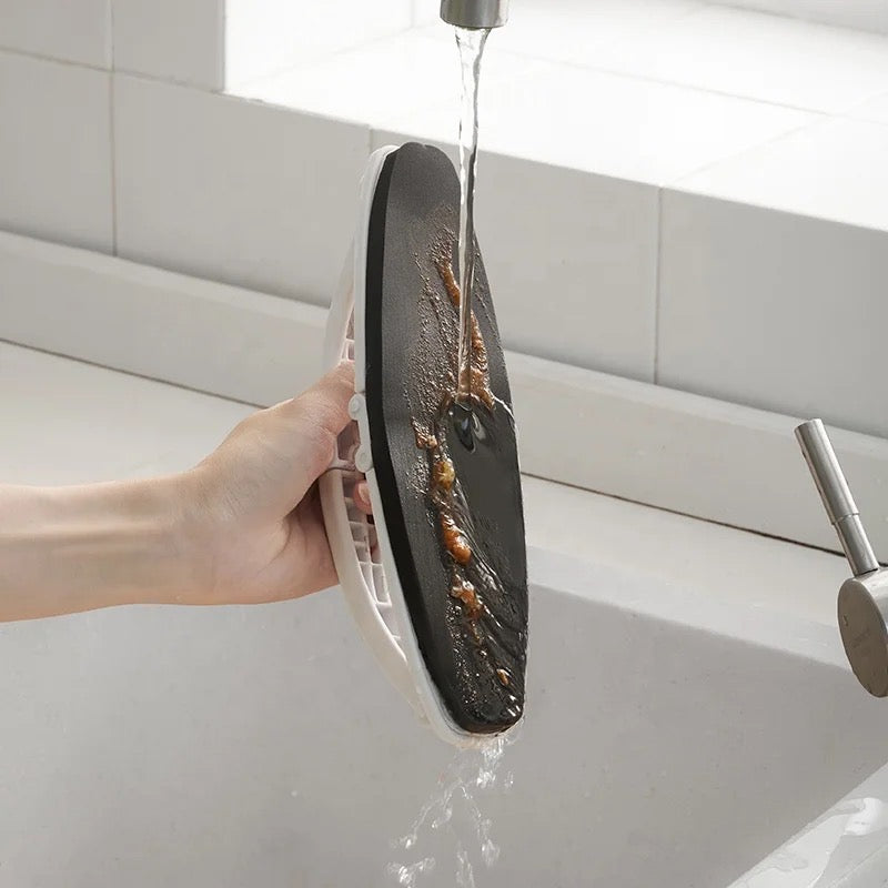 Someone holding Folding Sponge Cleaning Brush