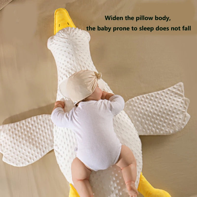 a baby laying on the Baby Exhaust Newborns Comfort Pillow