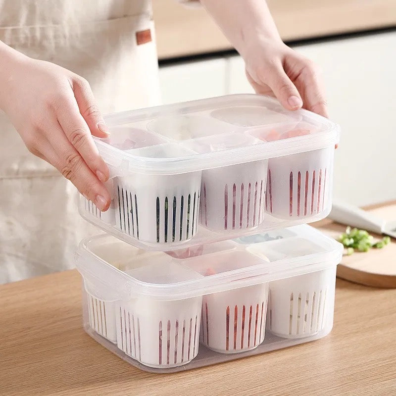 A woman holds a plastic container with food in it. The 6-Grids Useful Refrigerator Food Fresh-keeping Storage Box is perfect for keeping food fresh