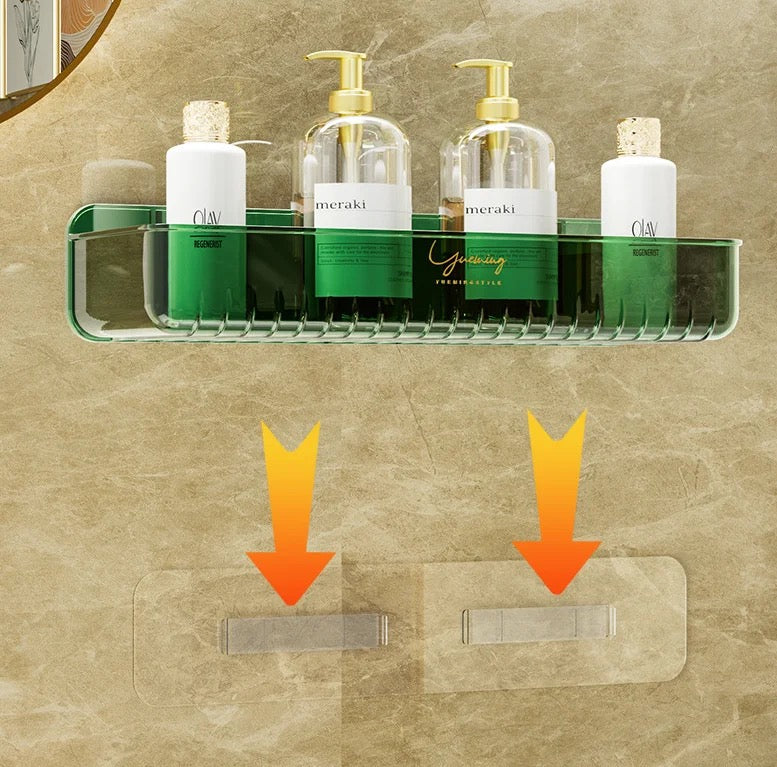 A wall-mounted green bathroom storage rack with toiletries, shampoo, and cosmetics