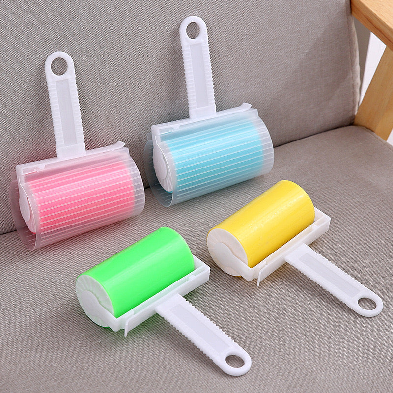 All color variants of Reusable Lint Remover kept on a sofa,2 of them with cap opened and the other 2 are closed with cap