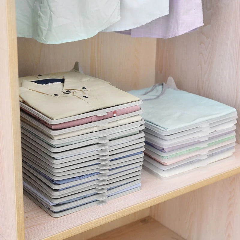 Shirts and t-shirts organized inside a cupboard with help of Wardrobe Clothes Stacking Organizer