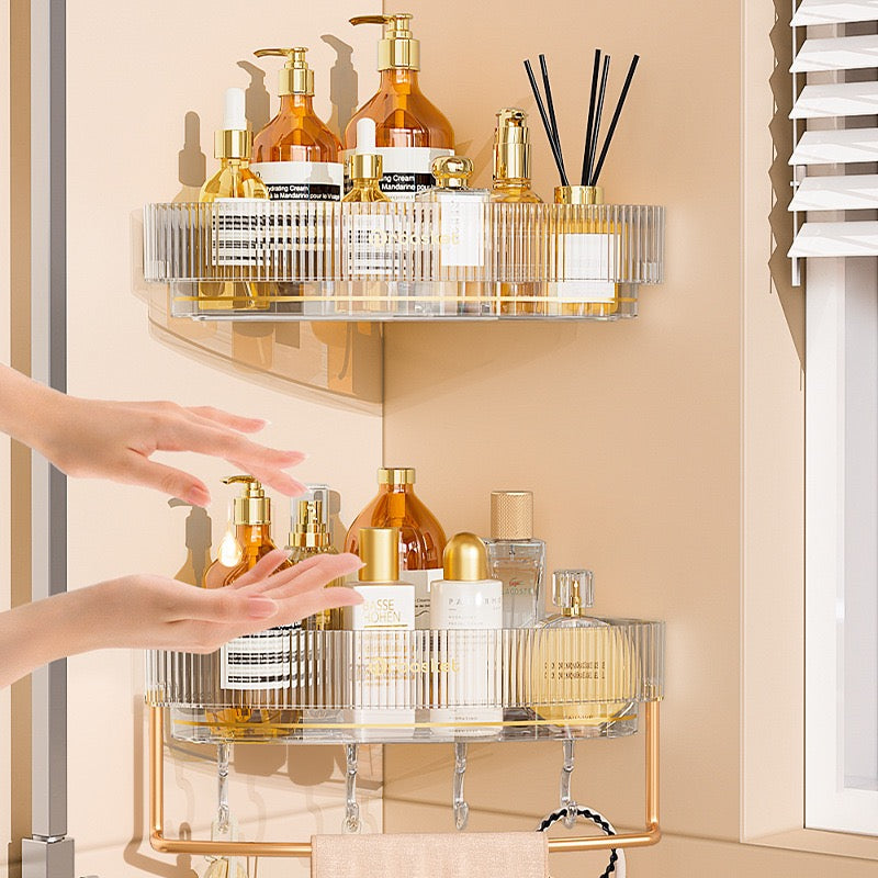 A person reaching for soap and other items on a Wall-Mounted Bathroom Triangle Shelf.