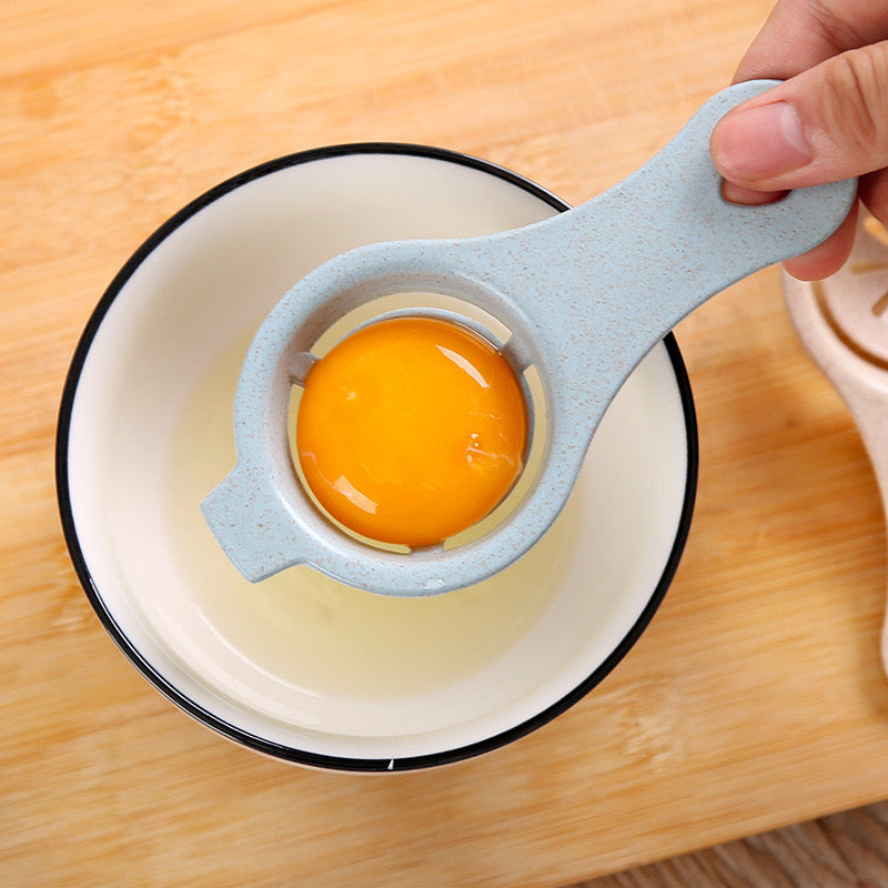 Egg yolk being separated using Egg Separator Tool