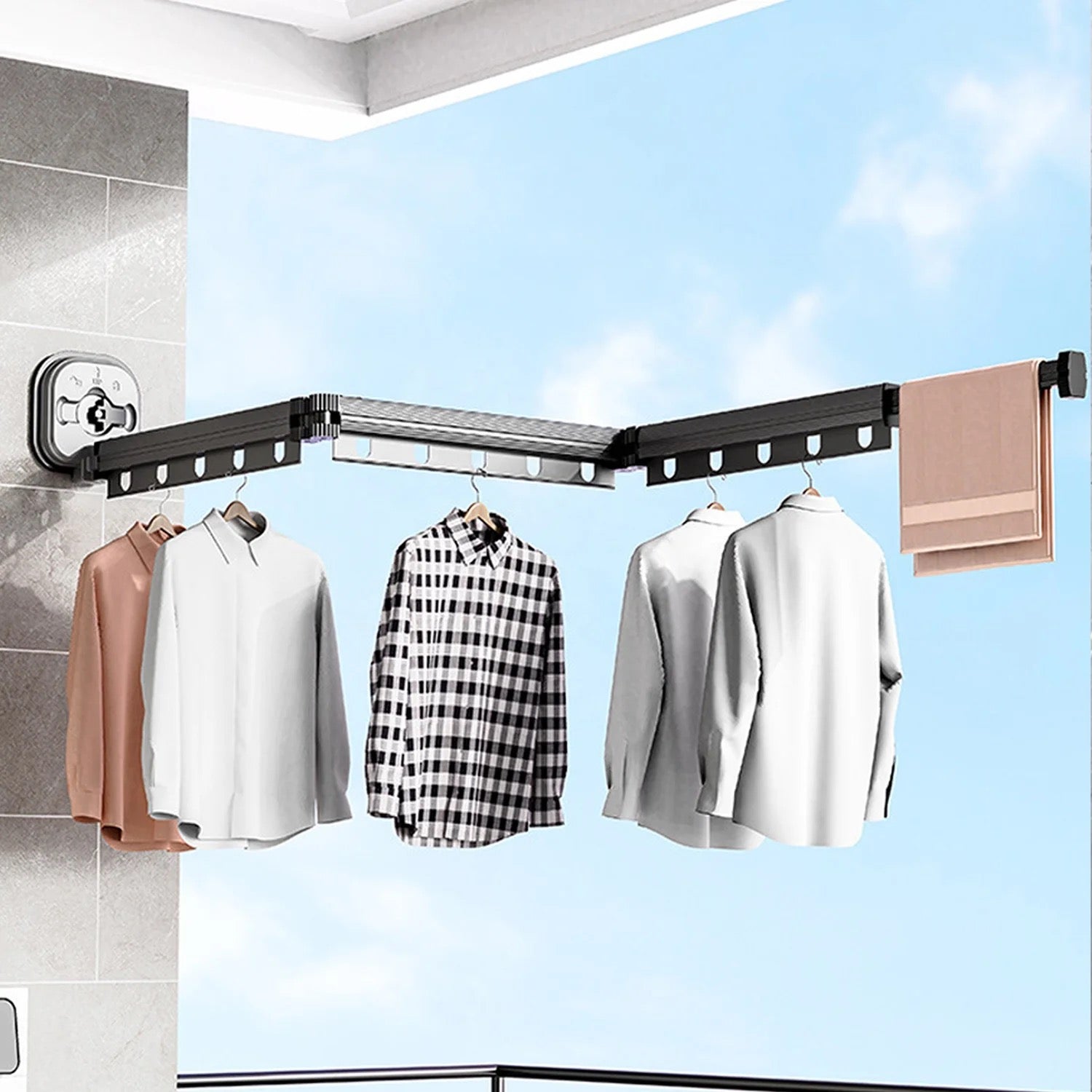 Folding Laundry Rack mounted on a wall with shirts hung 